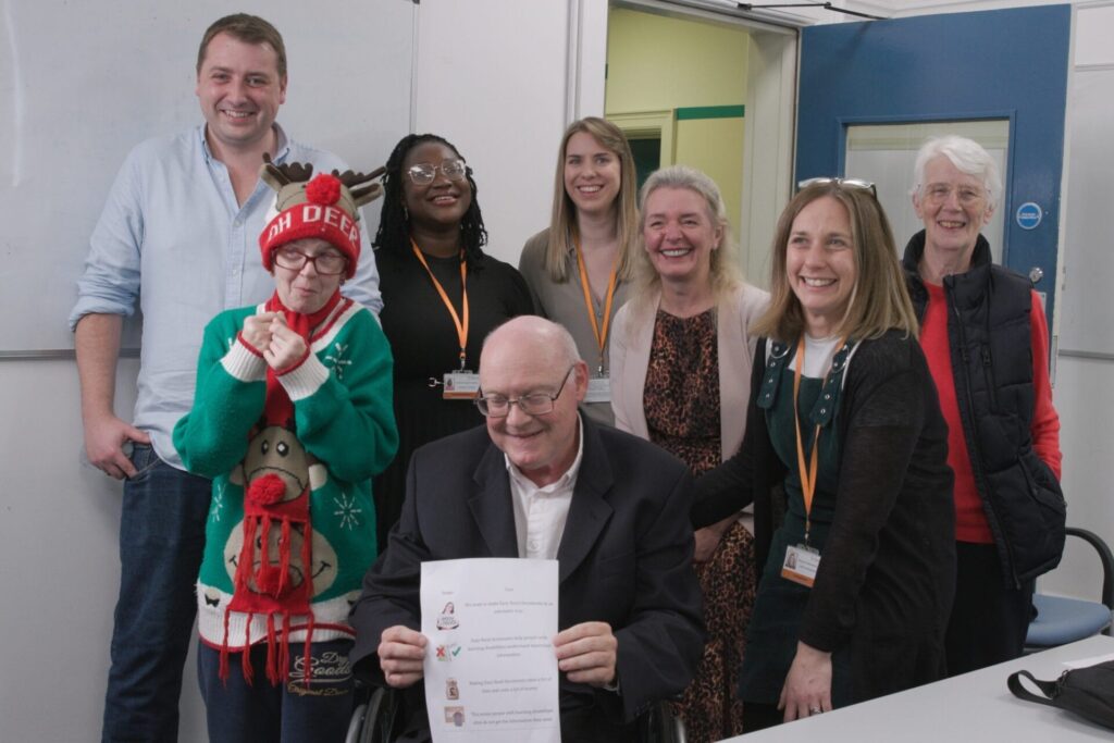 a group of people posing for a photo